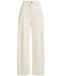 Brunello Cucinelli - Dyed Cotton And Wool Wrinkled Denim Five-Pocket Baggy Trousers With Monili - Lyst