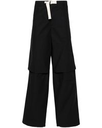 Jil Sander - Pantalones holgados con cinturón - Lyst