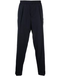 Woolrich - Commuting Tapered-leg Trousers - Lyst