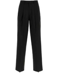 Givenchy - Pleated Wool-Blend Trousers - Lyst
