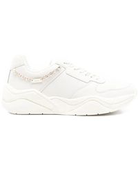ARMANI EXCHANGE - Logo-Charm Leather Sneakers - Lyst