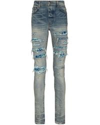 Amiri - Pj Trasher Distressed-effect Skinny Jeans - Lyst