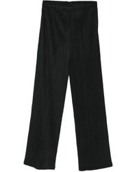 Issey Miyake - Pantalones con efecto plisado - Lyst