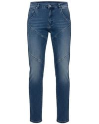 92 - Iconic Slim-Fit Jeans - Lyst