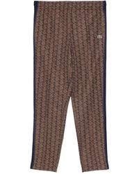 Lacoste - Logo-Patch Trousers - Lyst