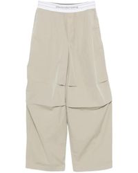 Alexander Wang - Logo-Elastic Pleated-Knee Trousers - Lyst