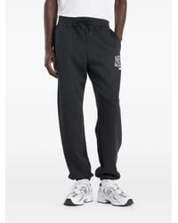 New Balance - Drawstring Logo Track Pants - Lyst