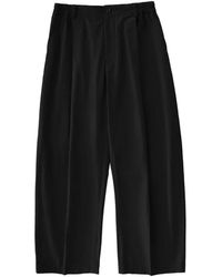 Studio Nicholson - Shire Pleated Cotton Trousers - Lyst