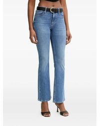 Guess - Logo-Plaque Flared Jeans - Lyst