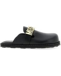 Moschino - Metal-Lettering Leather Mules - Lyst