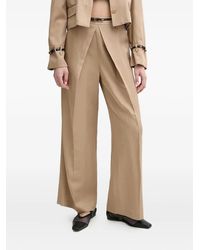 Isabelle Blanche - Pleated Belted Trousers - Lyst