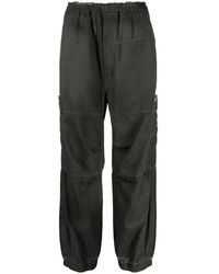 Izzue - Logo-embroidered Trousers - Lyst