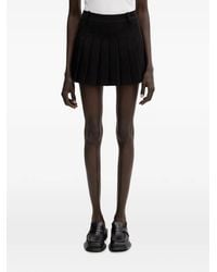 WRSTBHVR - Nuria Pleated Mini Kirt - Lyst