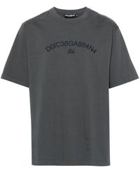 Dolce & Gabbana - | T-shirt con stampa logo a maniche corte in cotone | male | GRIGIO | 46 - Lyst