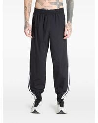 adidas - Firebird Wvn Trousers - Lyst