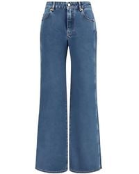 Balmain - Wide-Leg Logo-Embroidered Jeans - Lyst