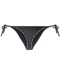 Calvin Klein - Slip bikini con decorazione - Lyst