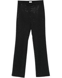 ANDAMANE - Pantalones con aplique de cristales - Lyst