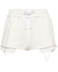 Miu Miu - Logo-Embroidered Distressed Cotton Track Shorts - Lyst