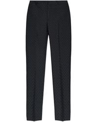 McQueen - Skull-Pattern Trousers - Lyst