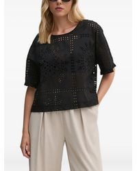 Sandro Ferrone - Kurzärmelige Bluse mit Ösenstickerei - Lyst