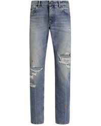 Dolce & Gabbana - Ripped Logo-Plaque Jeans - Lyst