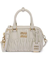 Miu Miu - Logo-plaque Matelassé Leather Mini Bag - Lyst