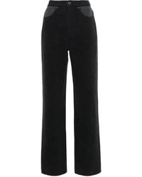 ROTATE BIRGER CHRISTENSEN - Two-Tone Tapered Jeans - Lyst