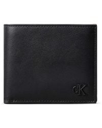 Calvin Klein - Logo-Embossed Bi-Fold Wallet - Lyst