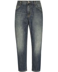 Dolce & Gabbana - Jeans affusolati con applicazione - Lyst