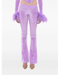 Adriana Hot Couture - Logo-Embellished Flared Trousers - Lyst
