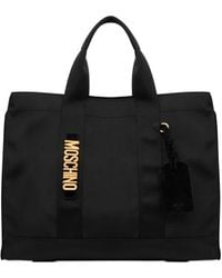 Moschino - ロゴプレート ハンドバッグ - Lyst
