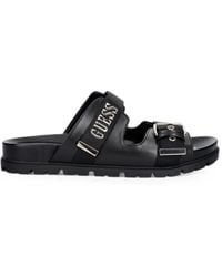 Guess - Flache Sandalen Mit Schnalle - Lyst