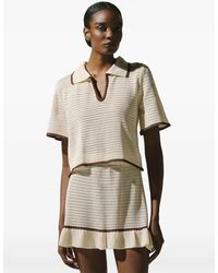 Baobab - Ruffled-Hem Knit Mini Skirt - Lyst