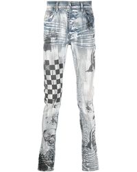 Amiri - Slim-Fit-Jeans mit Graffiti-Print - Lyst