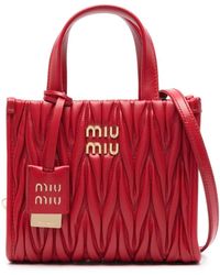 Miu Miu - Kleine Handtasche mit Logo-Schild - Lyst