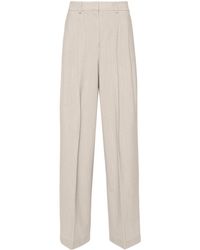Theory - Pantalones anchos con pliegues - Lyst