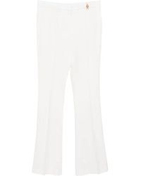 Versace - Wool Trousers - Lyst