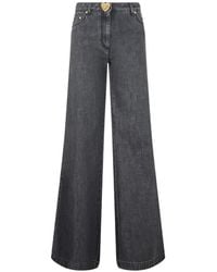 Moschino - Heart-Button Wide-Leg Jeans - Lyst