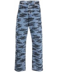Vetements - Vaqueros rectos con logo estampado - Lyst
