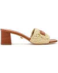 Versace - Logo Raffia Mules - Lyst