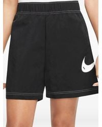 Nike - Swoosh Ruimvallende High Waist Shorts - Lyst