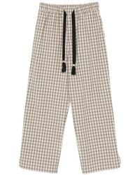 Nanushka - Check-Pattern Tassel-Detail Trousers - Lyst