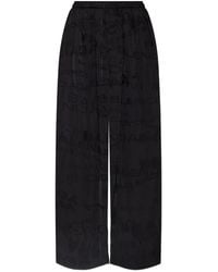 Balenciaga - Logo Flared Trousers - Lyst