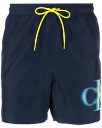 Calvin Klein - Logo-Print Swim Shorts - Lyst