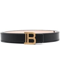 Balmain - Cintura nera con logo oro - Lyst