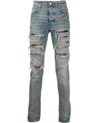 Amiri - Distressed Skinny Jeans - Lyst
