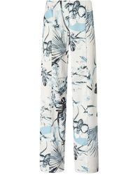 Genny - Floral-Print Trousers - Lyst