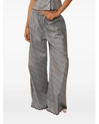 Montce - Gewelfde Broek Met Bloemenprint - Lyst