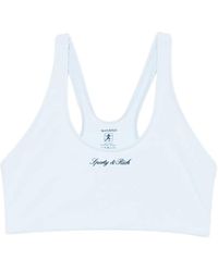 Sporty & Rich - Logo-Detail Racerback Sports Bra - Lyst